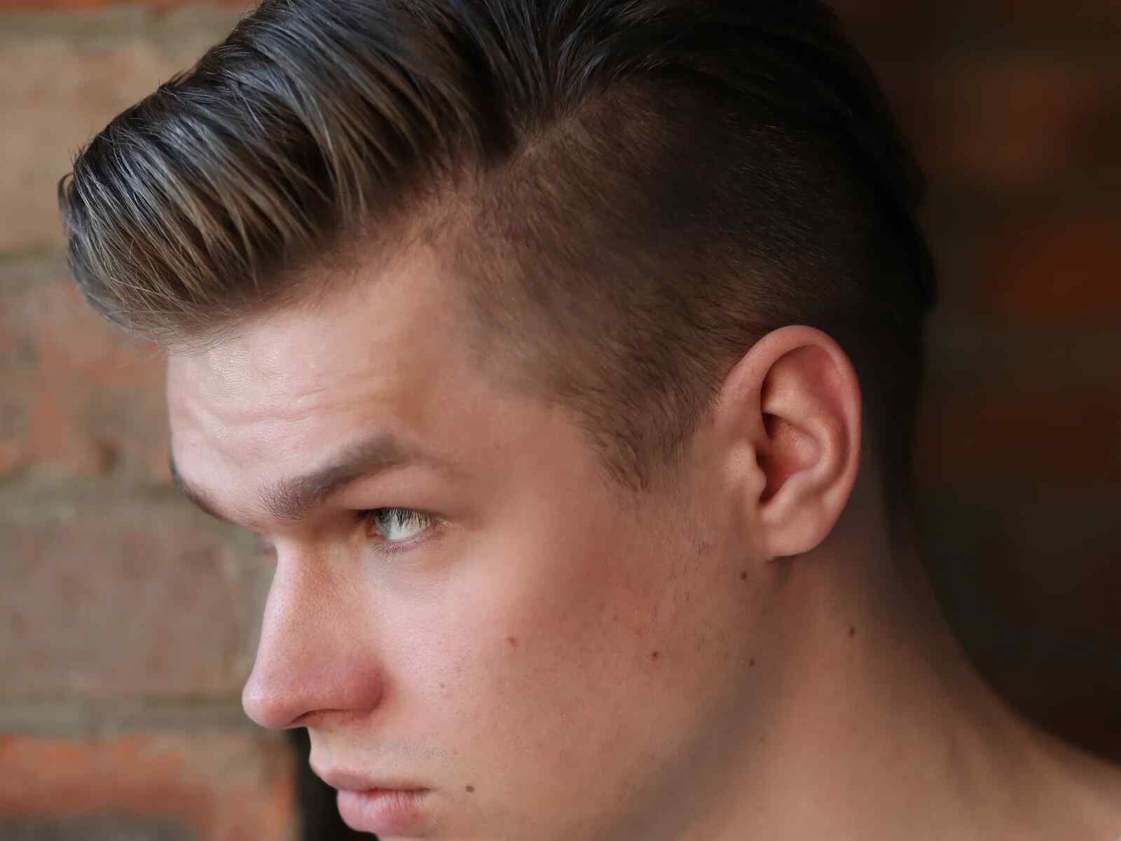 Variety of mid fade hairstyles on diverse hair types